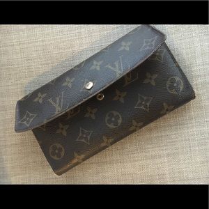 LOUIS VUITTON
Monogram Porte Tresor Wallet